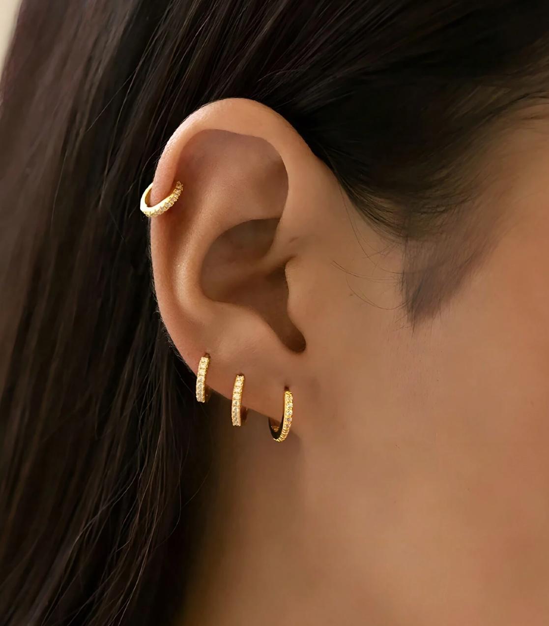 Huggies - A pair of stainless steel gold  earrings