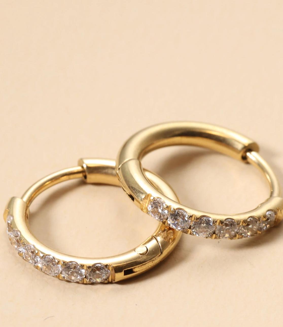 Huggies - A pair of stainless steel gold  earrings