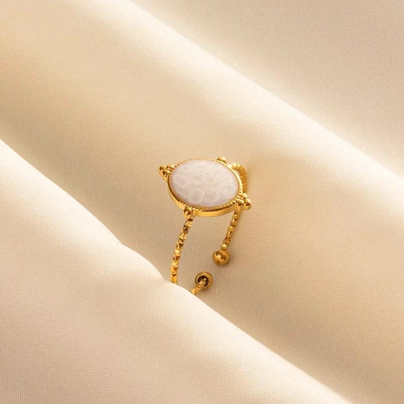 Adjustable ring with marble stainless steel